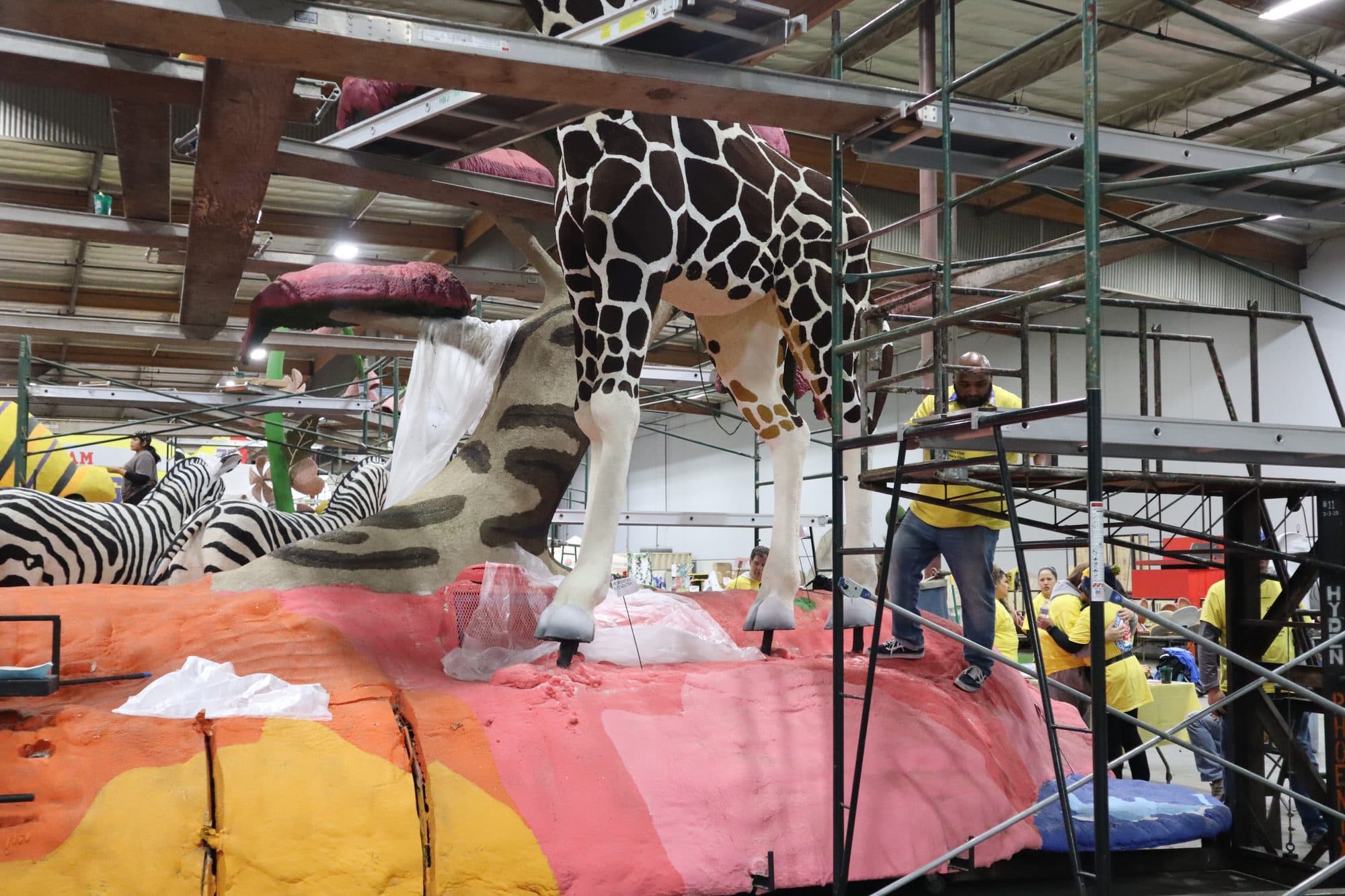 Decorating the Rotary Rose Parade float, frame 1