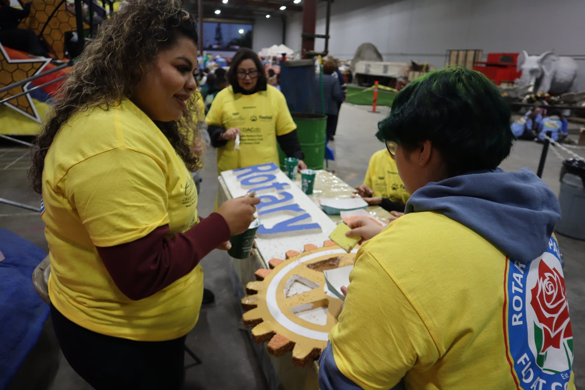 Decorating the Rotary Rose Parade float, frame 7
