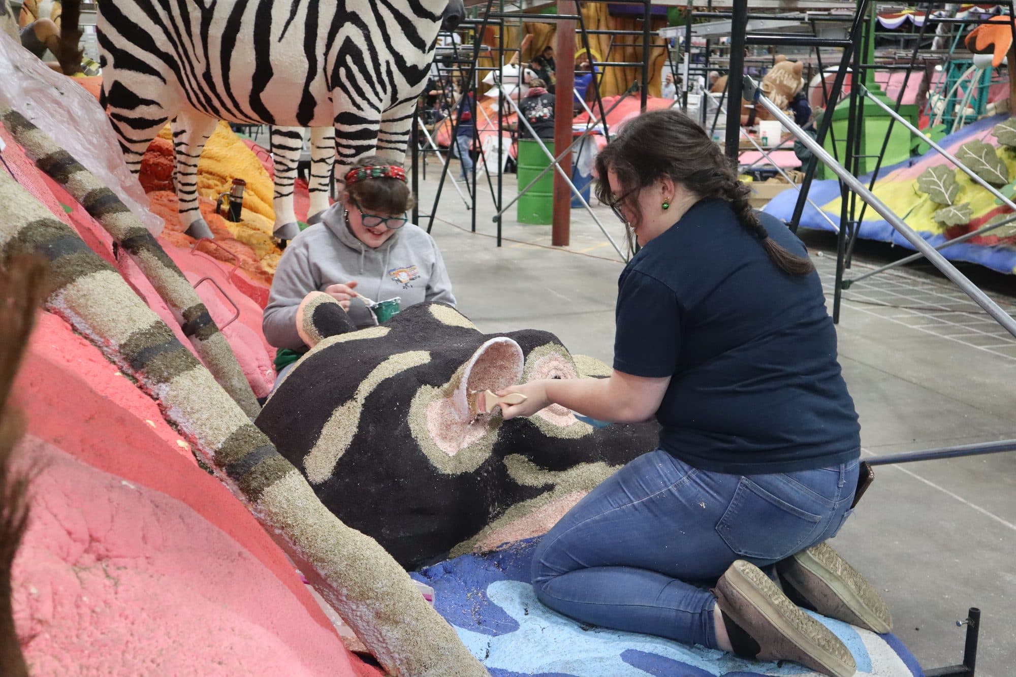 Decorating the Rotary Rose Parade float, frame 19