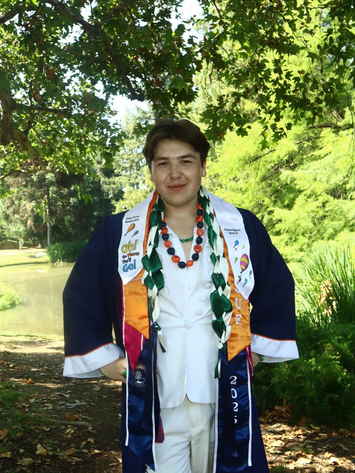 Gregory Ferraro in his cap-and-gown stoles on graduation day